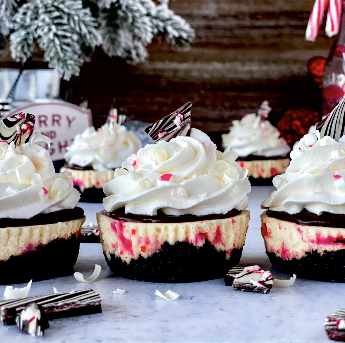 Mini Peppermint Bark Cheesecakes With Chocolate Ganache - Bake Drizzle Dust